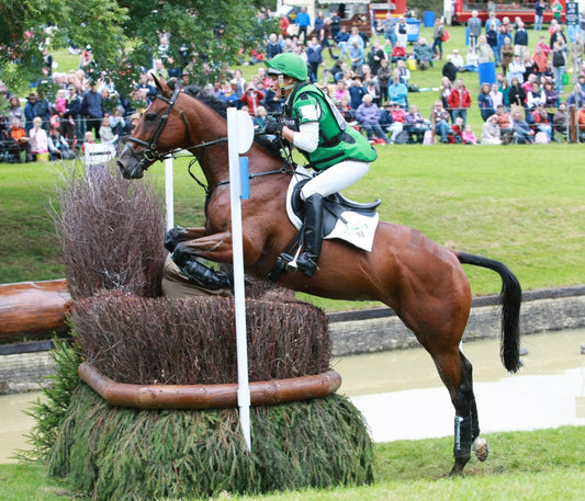 Mary King &amp; Oliver Townend signing on Treehouse stand at Burghley.